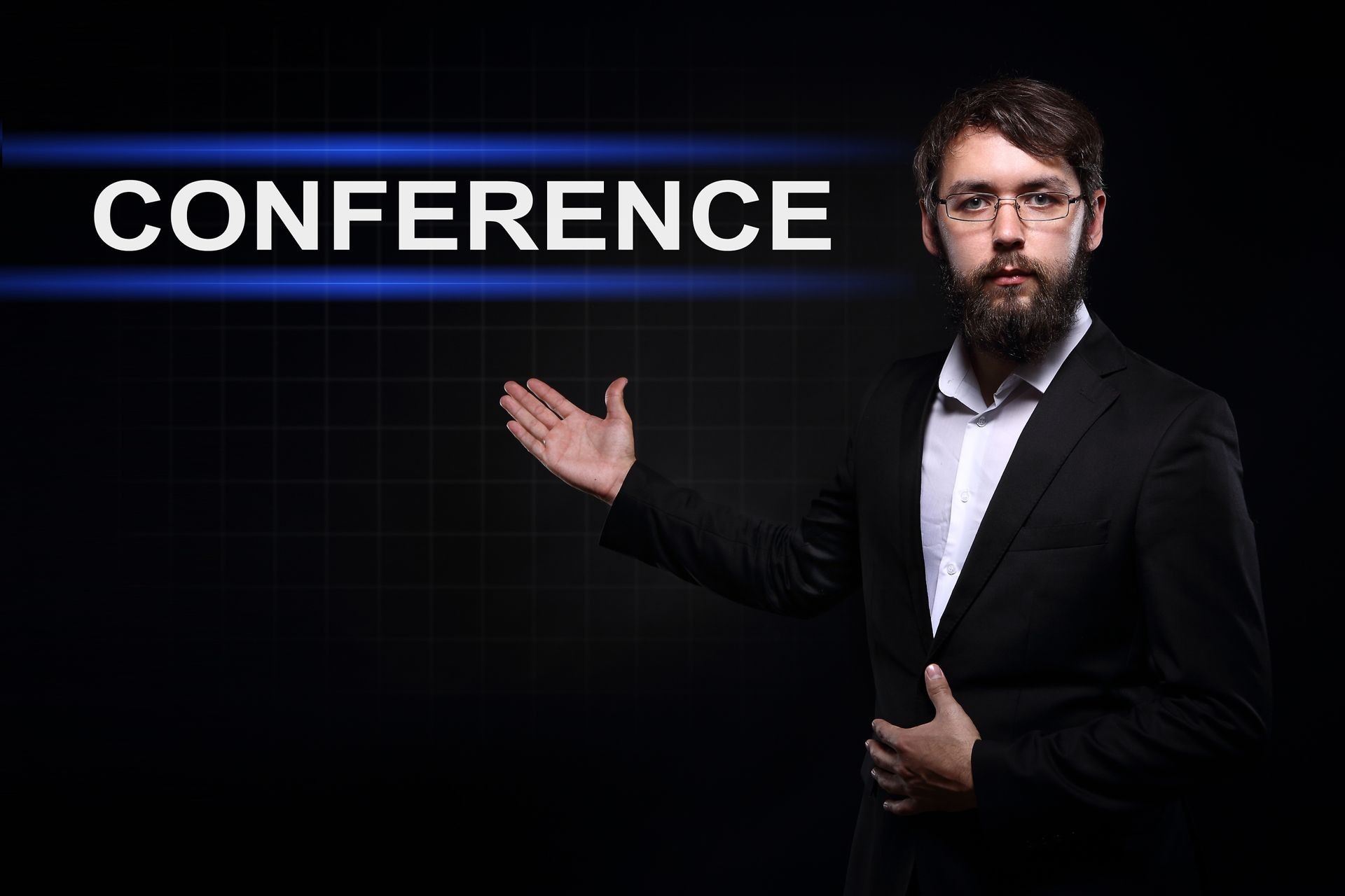 Businessman over black background presenting Conference